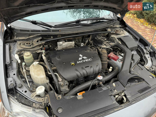 Сірий Міцубісі Lancer, об'ємом двигуна 2 л та пробігом 92 тис. км за 8200 $, фото 45 на Automoto.ua