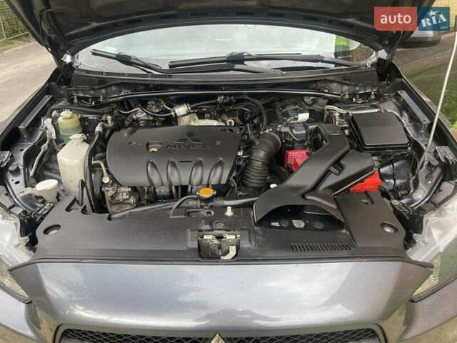 Сірий Міцубісі Lancer, об'ємом двигуна 2 л та пробігом 234 тис. км за 7200 $, фото 11 на Automoto.ua