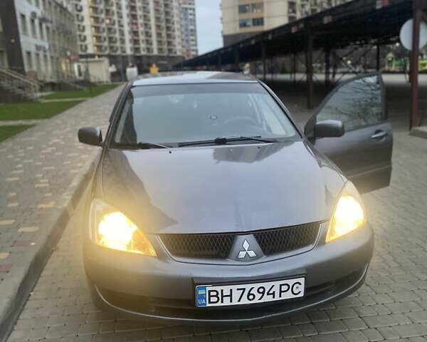 Сірий Міцубісі Lancer, об'ємом двигуна 1.6 л та пробігом 250 тис. км за 3500 $, фото 11 на Automoto.ua