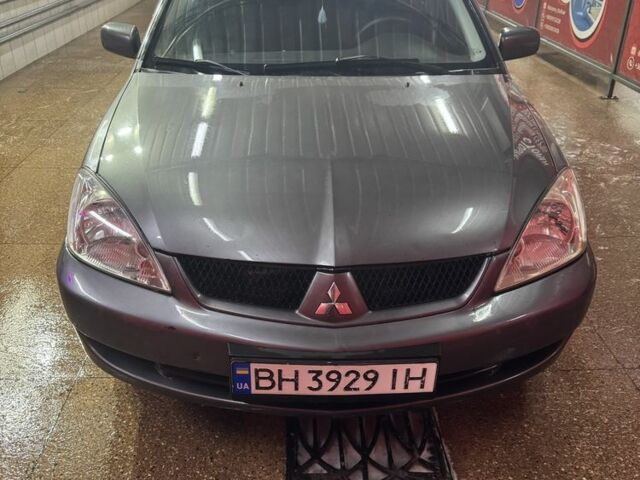 Серый Мицубиси Лансер, объемом двигателя 1.6 л и пробегом 268 тыс. км за 4600 $, фото 1 на Automoto.ua