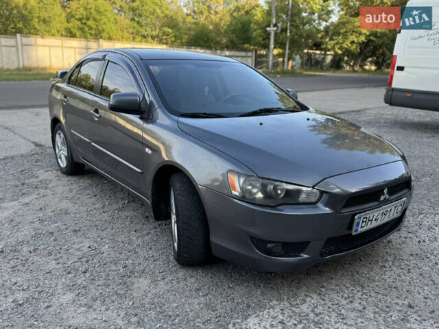 Сірий Міцубісі Lancer, об'ємом двигуна 2 л та пробігом 292 тис. км за 5500 $, фото 4 на Automoto.ua