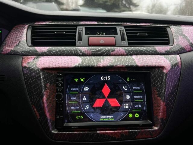 Серый Мицубиси Лансер, объемом двигателя 1.6 л и пробегом 205 тыс. км за 5400 $, фото 10 на Automoto.ua