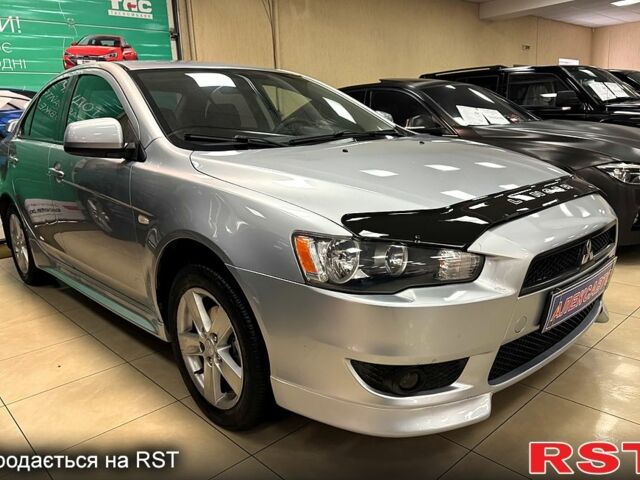 Серый Мицубиси Лансер, объемом двигателя 1.5 л и пробегом 241 тыс. км за 6400 $, фото 4 на Automoto.ua