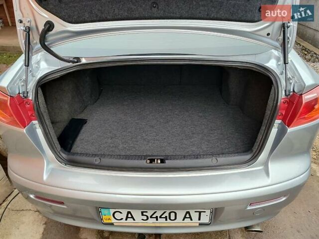 Серый Мицубиси Лансер, объемом двигателя 2 л и пробегом 234 тыс. км за 7200 $, фото 13 на Automoto.ua