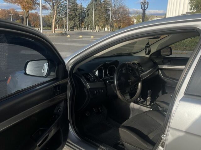 Сірий Міцубісі Lancer, об'ємом двигуна 1.5 л та пробігом 300 тис. км за 5499 $, фото 5 на Automoto.ua