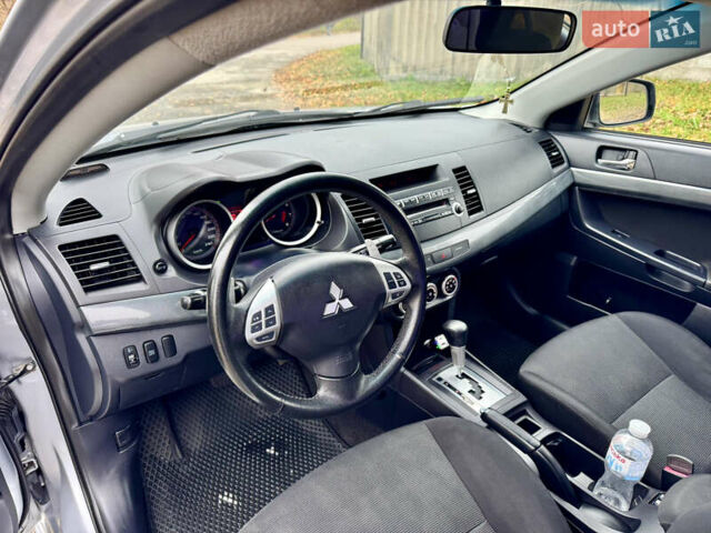 Сірий Міцубісі Lancer, об'ємом двигуна 2 л та пробігом 225 тис. км за 6890 $, фото 9 на Automoto.ua