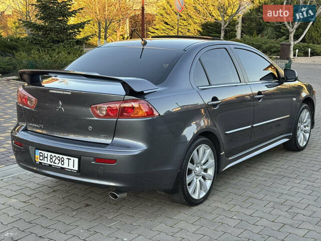 Сірий Міцубісі Lancer, об'ємом двигуна 2 л та пробігом 92 тис. км за 9800 $, фото 60 на Automoto.ua