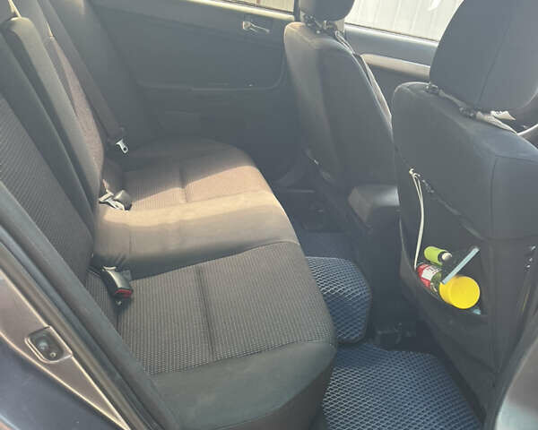 Сірий Міцубісі Lancer, об'ємом двигуна 1.8 л та пробігом 207 тис. км за 5800 $, фото 4 на Automoto.ua