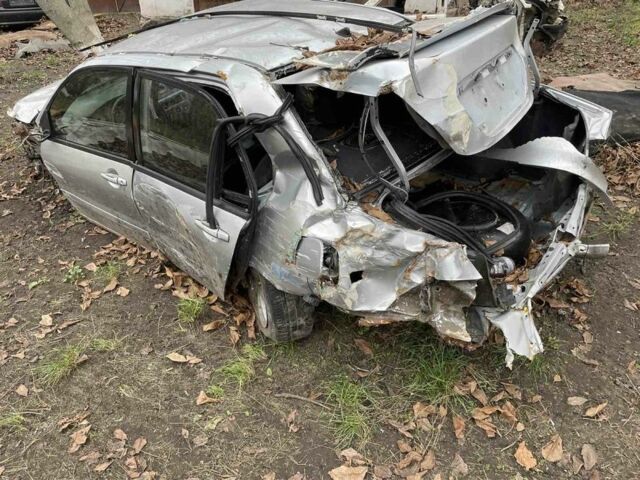 Серый Мицубиси Лансер, объемом двигателя 1.6 л и пробегом 280 тыс. км за 900 $, фото 3 на Automoto.ua