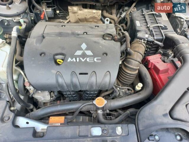 Серый Мицубиси Лансер, объемом двигателя 2 л и пробегом 103 тыс. км за 7700 $, фото 9 на Automoto.ua