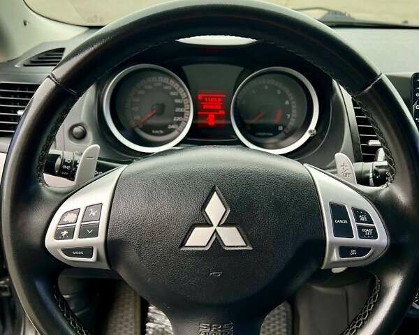 Серый Мицубиси Лансер, объемом двигателя 2 л и пробегом 203 тыс. км за 4999 $, фото 13 на Automoto.ua