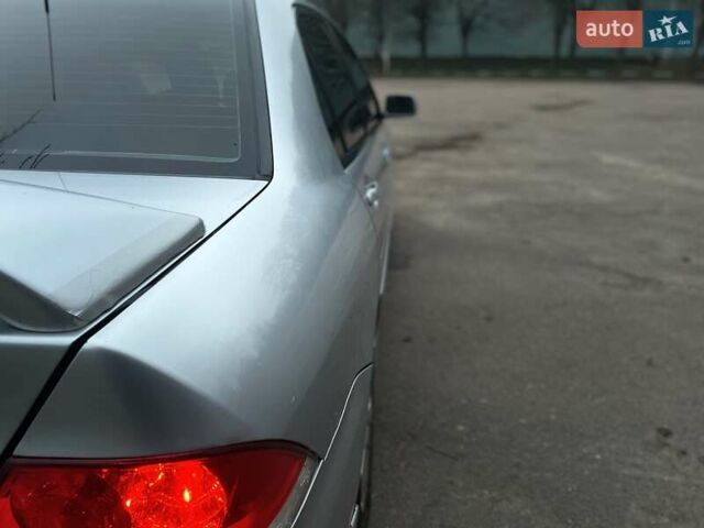 Сірий Міцубісі Lancer, об'ємом двигуна 1.6 л та пробігом 254 тис. км за 3800 $, фото 10 на Automoto.ua