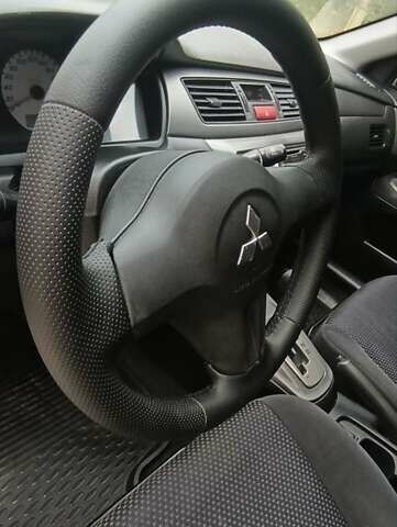 Сірий Міцубісі Lancer, об'ємом двигуна 1.6 л та пробігом 176 тис. км за 4999 $, фото 18 на Automoto.ua
