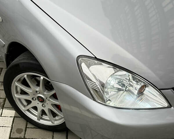 Сірий Міцубісі Lancer, об'ємом двигуна 1.6 л та пробігом 269 тис. км за 3999 $, фото 4 на Automoto.ua