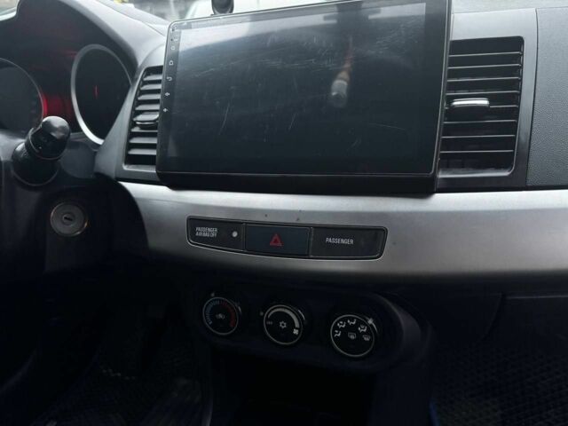 Серый Мицубиси Лансер, объемом двигателя 1.5 л и пробегом 147 тыс. км за 6700 $, фото 14 на Automoto.ua