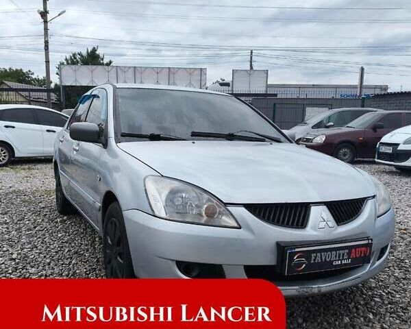 Сірий Міцубісі Lancer, об'ємом двигуна 1.6 л та пробігом 240 тис. км за 2999 $, фото 9 на Automoto.ua