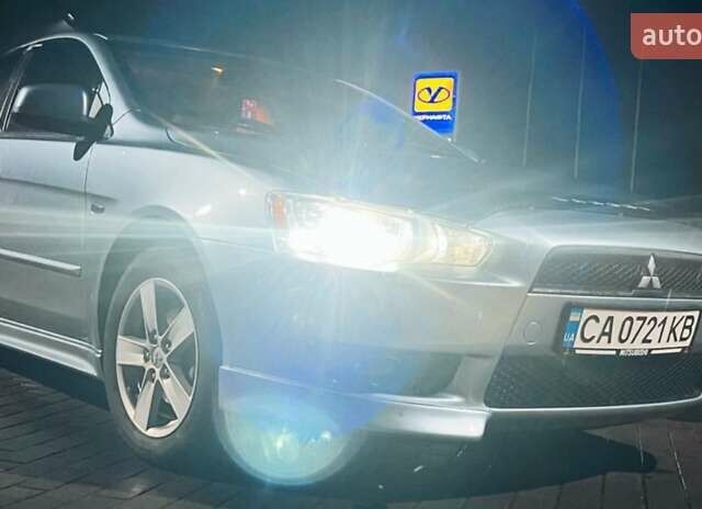 Сірий Міцубісі Lancer, об'ємом двигуна 2 л та пробігом 213 тис. км за 7300 $, фото 12 на Automoto.ua