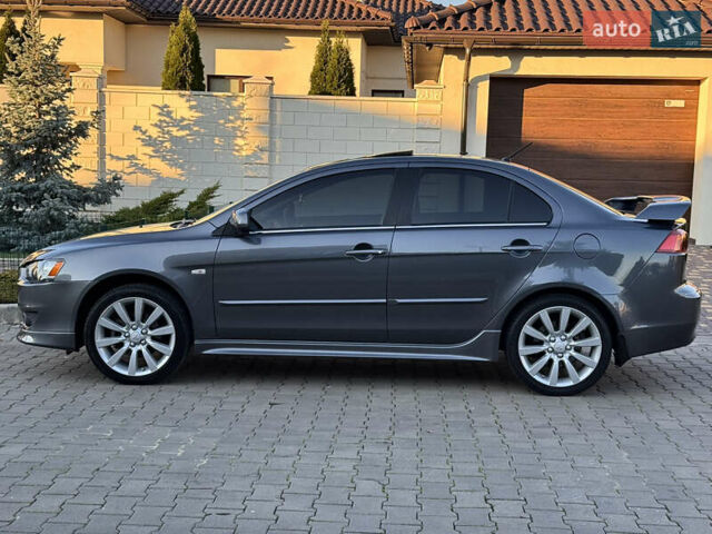 Сірий Міцубісі Lancer, об'ємом двигуна 2 л та пробігом 92 тис. км за 9800 $, фото 33 на Automoto.ua
