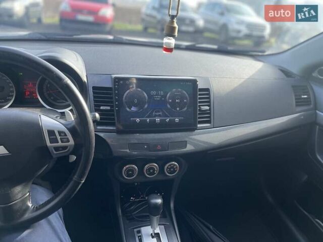 Сірий Міцубісі Lancer, об'ємом двигуна 2 л та пробігом 92 тис. км за 7700 $, фото 5 на Automoto.ua