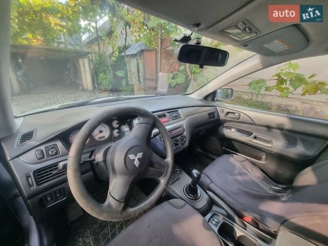 Сірий Міцубісі Lancer, об'ємом двигуна 1.6 л та пробігом 290 тис. км за 3850 $, фото 3 на Automoto.ua