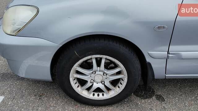 Серый Мицубиси Лансер, объемом двигателя 1.58 л и пробегом 216 тыс. км за 4700 $, фото 8 на Automoto.ua