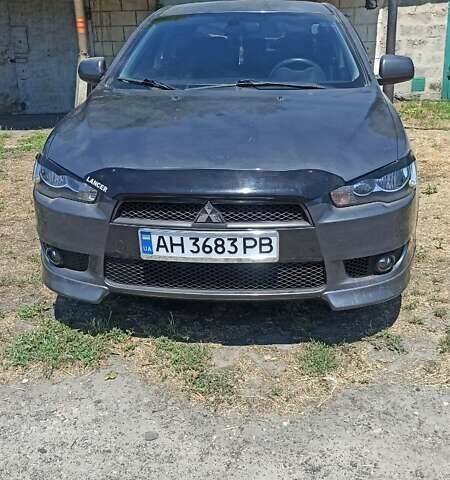 Сірий Міцубісі Lancer, об'ємом двигуна 2 л та пробігом 77 тис. км за 9800 $, фото 1 на Automoto.ua
