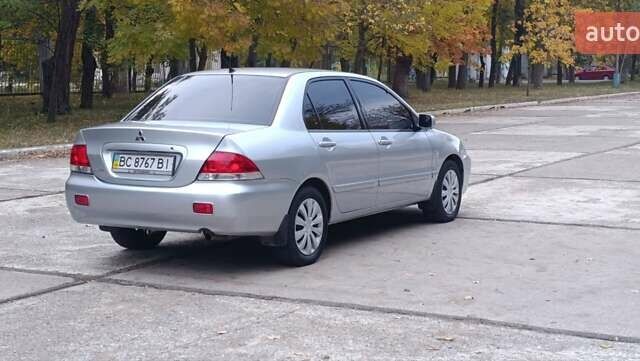 Сірий Міцубісі Lancer, об'ємом двигуна 1.6 л та пробігом 176 тис. км за 4999 $, фото 15 на Automoto.ua