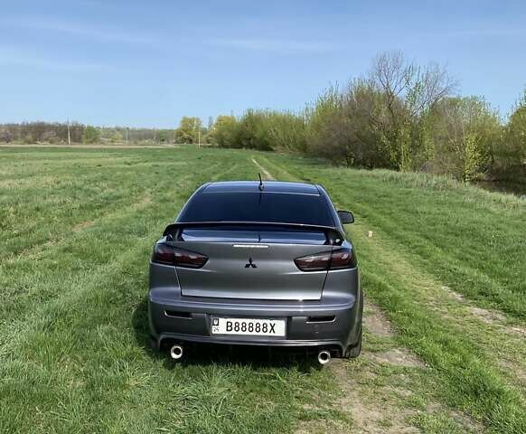 Сірий Міцубісі Lancer, об'ємом двигуна 2 л та пробігом 81 тис. км за 10800 $, фото 5 на Automoto.ua