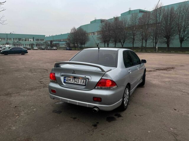 Сірий Міцубісі Lancer, об'ємом двигуна 1.6 л та пробігом 254 тис. км за 3800 $, фото 4 на Automoto.ua