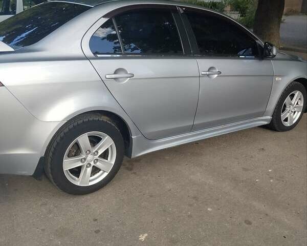 Сірий Міцубісі Lancer, об'ємом двигуна 2 л та пробігом 264 тис. км за 5500 $, фото 6 на Automoto.ua