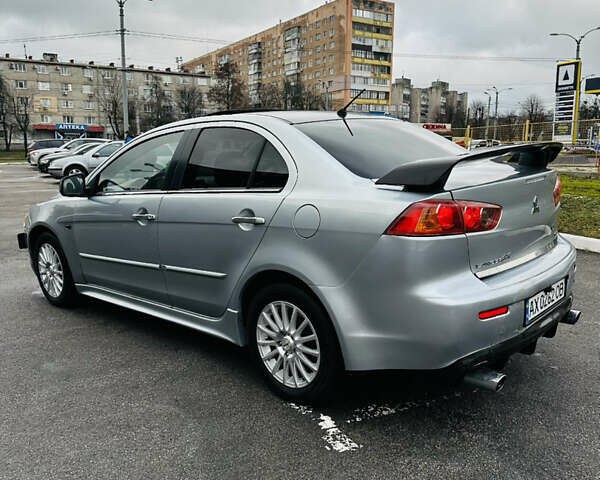 Сірий Міцубісі Lancer, об'ємом двигуна 2 л та пробігом 238 тис. км за 5350 $, фото 5 на Automoto.ua