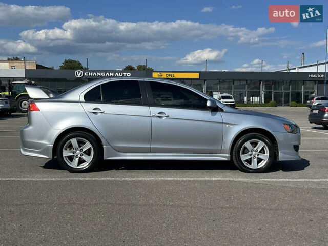 Сірий Міцубісі Lancer, об'ємом двигуна 2 л та пробігом 237 тис. км за 7200 $, фото 3 на Automoto.ua