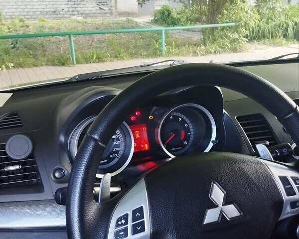 Сірий Міцубісі Lancer, об'ємом двигуна 2 л та пробігом 264 тис. км за 5500 $, фото 3 на Automoto.ua