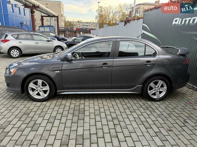 Серый Мицубиси Лансер, объемом двигателя 2 л и пробегом 230 тыс. км за 6900 $, фото 12 на Automoto.ua