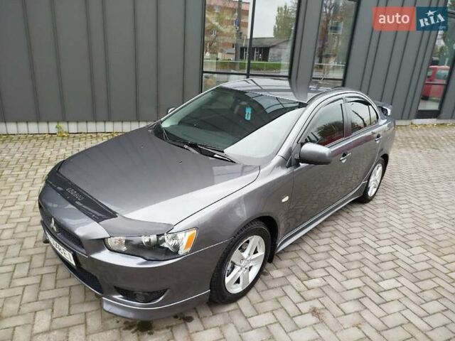Міцубісі Lancer 2008 у Хмельницькому на Automoto.ua Сірий Міцубісі Lancer, об'ємом двигуна 2 л та пробігом 157 тис. км за 6300 $, фото 11 на Automoto.ua