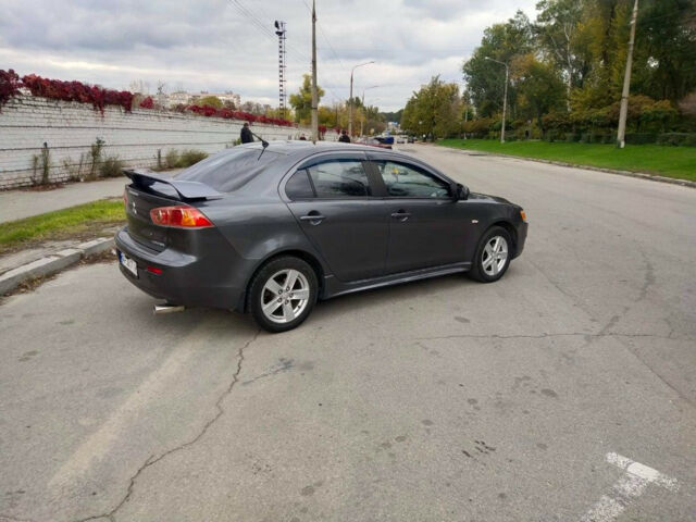 Сірий Міцубісі Lancer, об'ємом двигуна 2 л та пробігом 200 тис. км за 7100 $, фото 5 на Automoto.ua