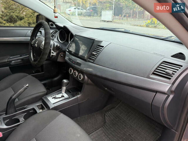 Сірий Міцубісі Lancer, об'ємом двигуна 2 л та пробігом 92 тис. км за 8200 $, фото 30 на Automoto.ua