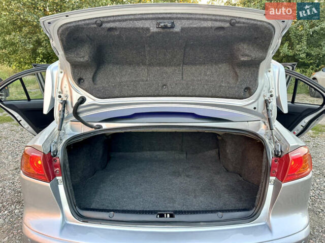 Сірий Міцубісі Lancer, об'ємом двигуна 2 л та пробігом 223 тис. км за 7390 $, фото 20 на Automoto.ua