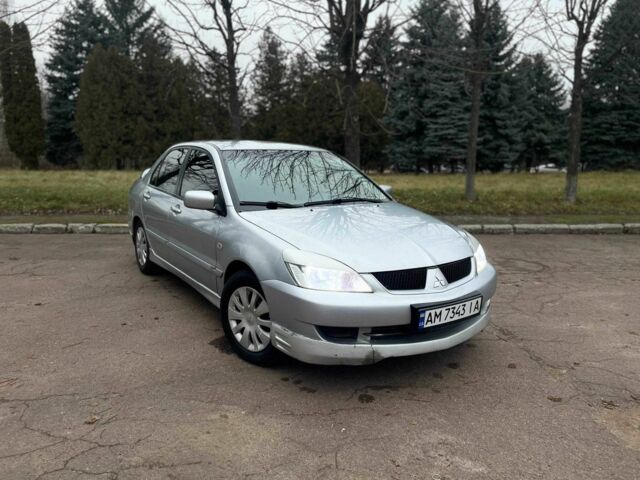 Сірий Міцубісі Lancer, об'ємом двигуна 1.6 л та пробігом 254 тис. км за 3800 $, фото 2 на Automoto.ua