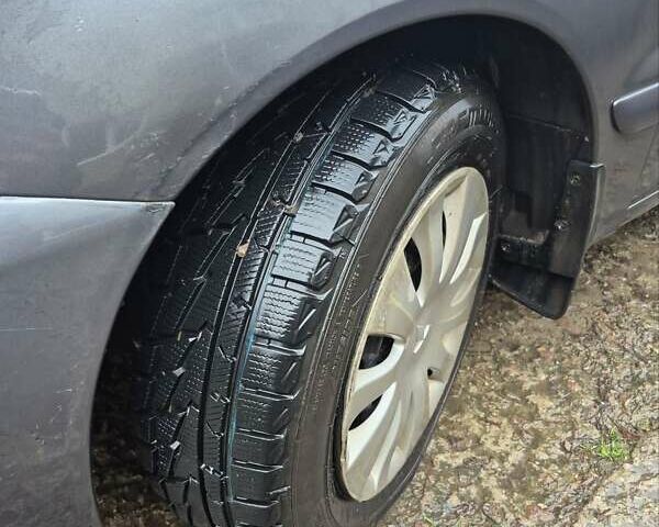 Сірий Міцубісі Lancer, об'ємом двигуна 1.6 л та пробігом 230 тис. км за 4400 $, фото 4 на Automoto.ua