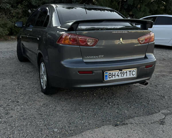 Сірий Міцубісі Lancer, об'ємом двигуна 2 л та пробігом 292 тис. км за 5500 $, фото 2 на Automoto.ua