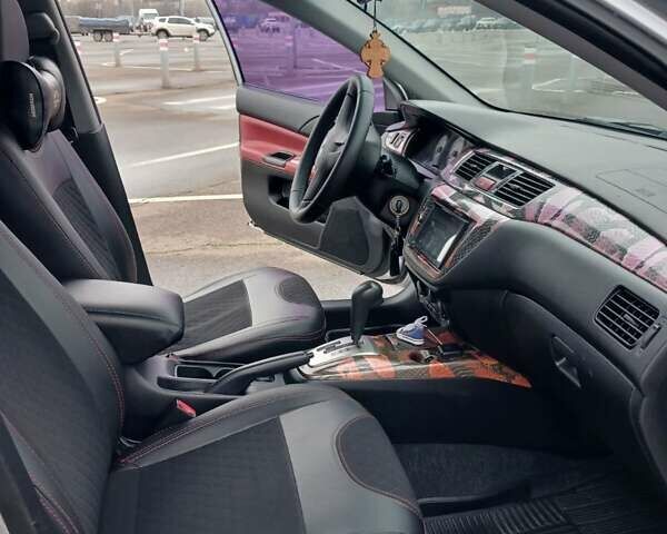 Сірий Міцубісі Lancer, об'ємом двигуна 1.6 л та пробігом 225 тис. км за 5200 $, фото 12 на Automoto.ua