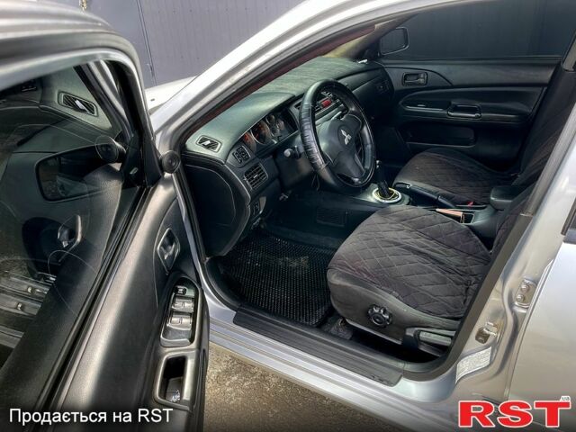 Сірий Міцубісі Lancer, об'ємом двигуна 1.6 л та пробігом 193 тис. км за 4500 $, фото 10 на Automoto.ua