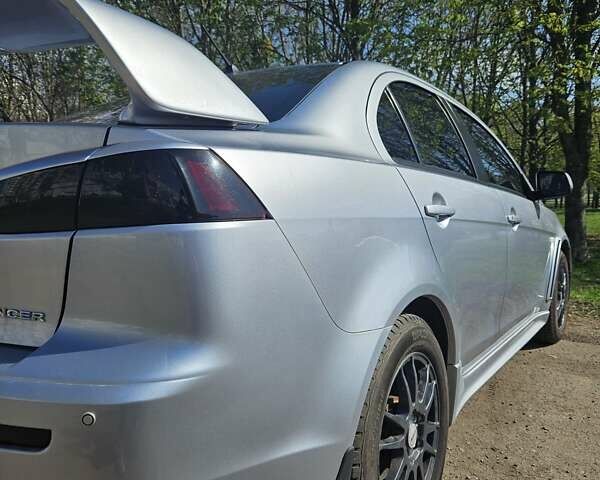 Сірий Міцубісі Lancer, об'ємом двигуна 2 л та пробігом 125 тис. км за 7600 $, фото 9 на Automoto.ua