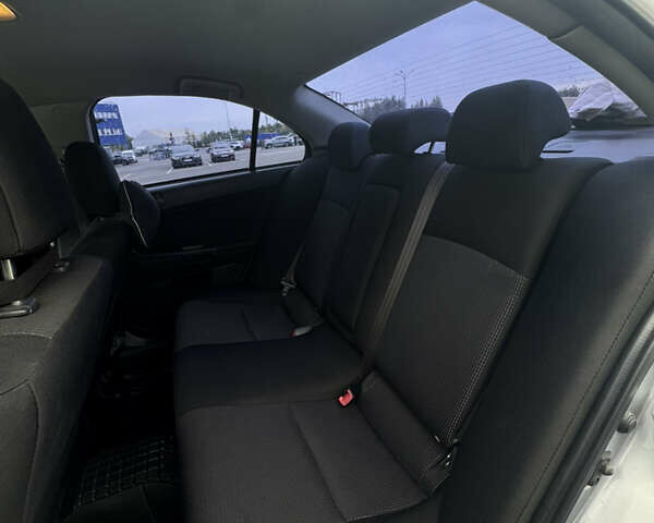 Сірий Міцубісі Lancer, об'ємом двигуна 2 л та пробігом 185 тис. км за 7000 $, фото 22 на Automoto.ua