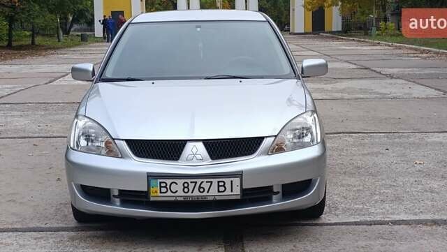 Сірий Міцубісі Lancer, об'ємом двигуна 1.6 л та пробігом 176 тис. км за 4999 $, фото 6 на Automoto.ua