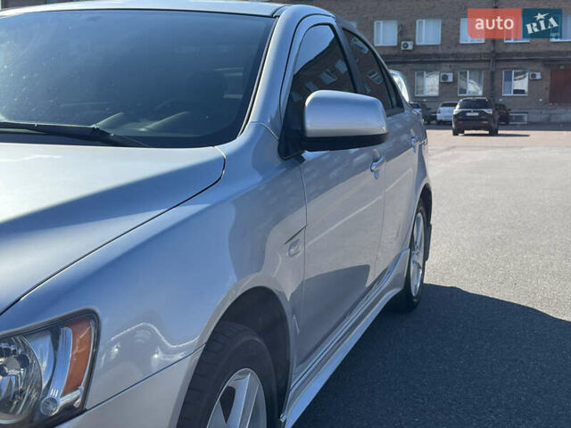 Сірий Міцубісі Lancer, об'ємом двигуна 2 л та пробігом 237 тис. км за 7200 $, фото 14 на Automoto.ua