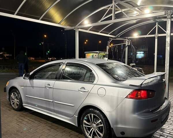 Серый Мицубиси Лансер, объемом двигателя 1.5 л и пробегом 306 тыс. км за 5750 $, фото 2 на Automoto.ua