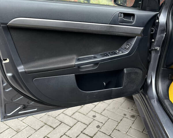 Сірий Міцубісі Lancer, об'ємом двигуна 2 л та пробігом 131 тис. км за 4899 $, фото 7 на Automoto.ua