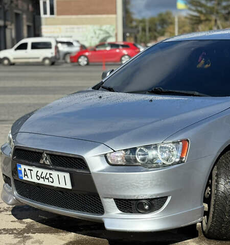 Серый Мицубиси Лансер, объемом двигателя 2 л и пробегом 190 тыс. км за 6900 $, фото 7 на Automoto.ua